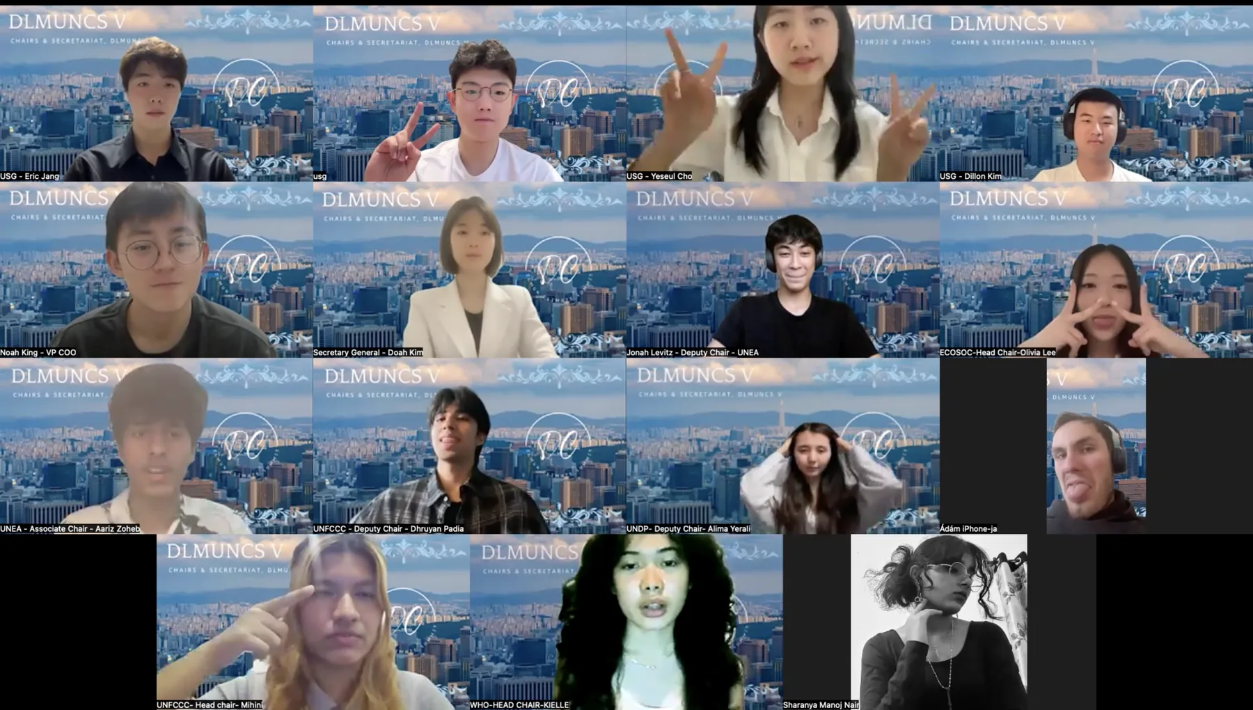 The DLMUNCS V chairs and secretariat on Zoom, fifteen students in large tiles, a few making peace signs, over the Seoul skyline background.